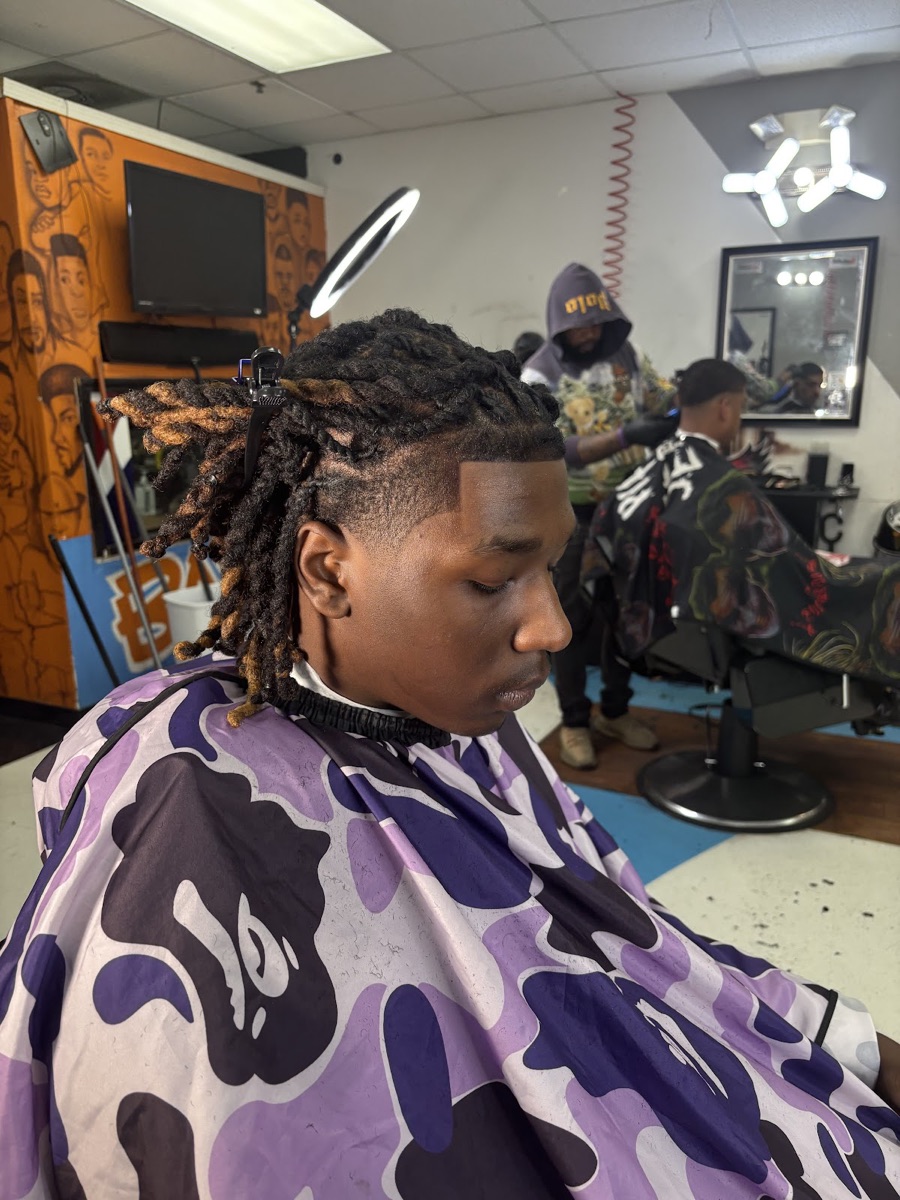 Fresh loc retwist and sharp taper fade at Westbound Barber Lounge & Salon in Stockbridge, GA